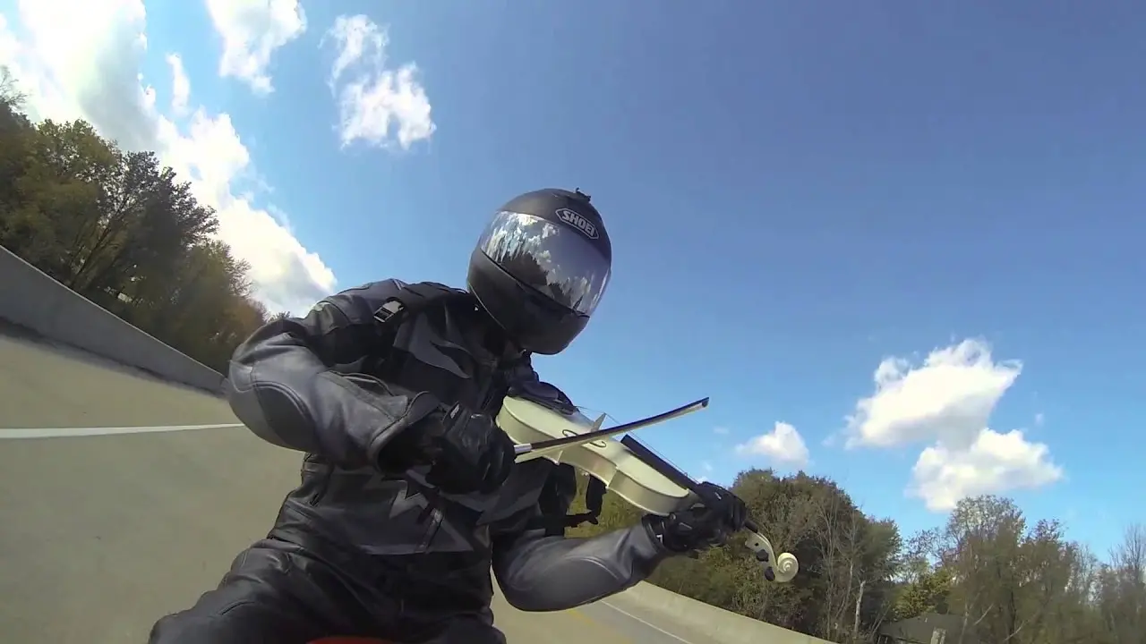 violin motorcycle - Is it OK to listen to music while riding a motorcycle