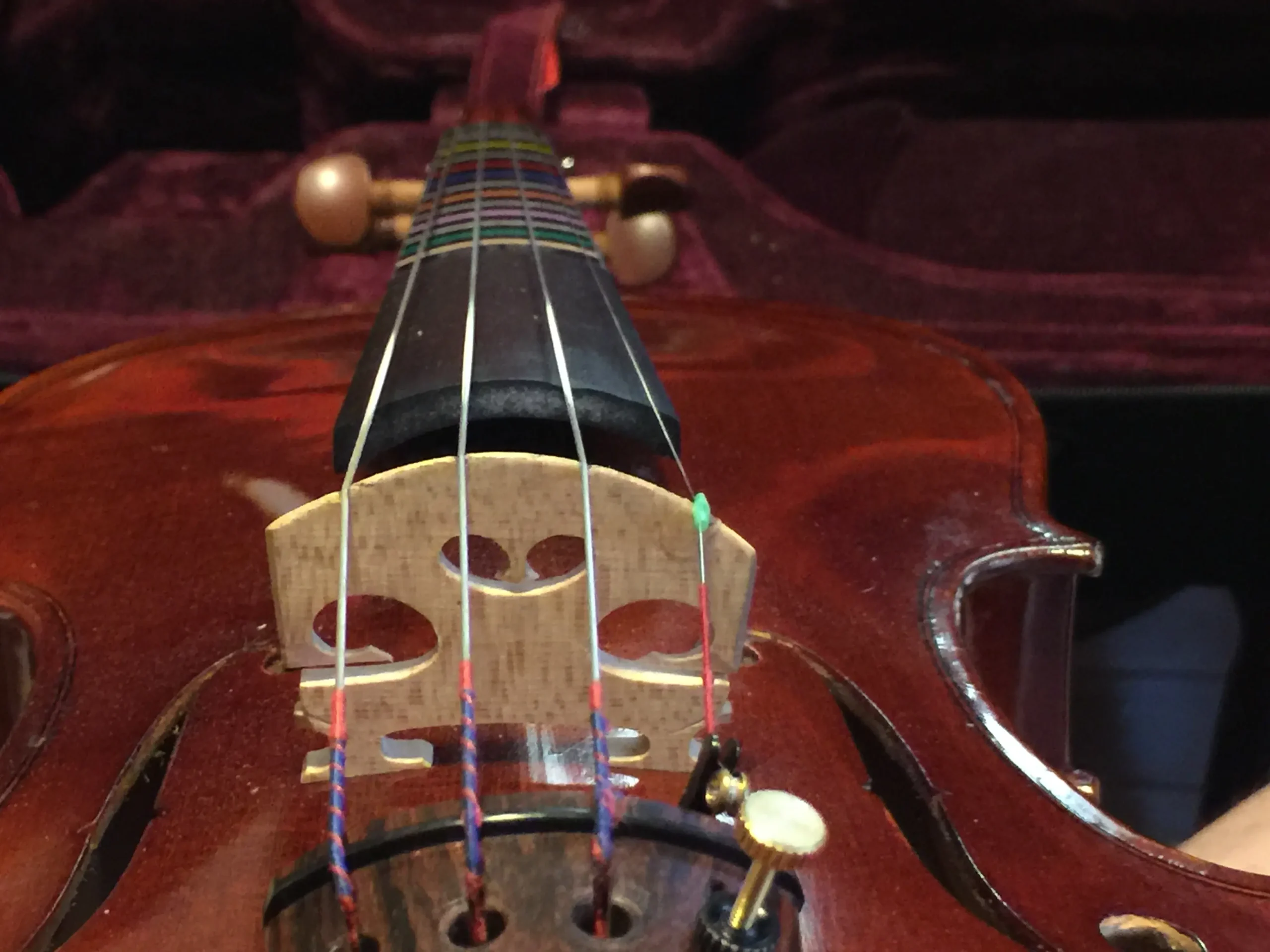violin bridge curvature - What is the correct angle of a violin bridge