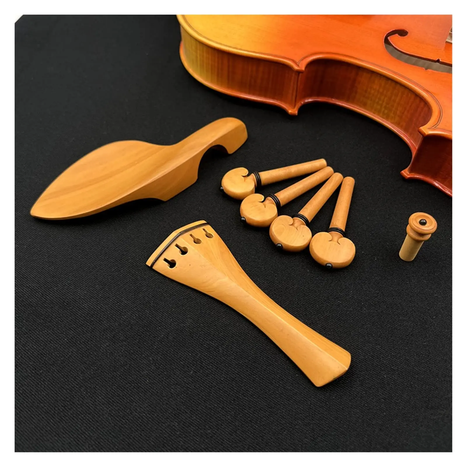 boxwood violin fittings - What is the difference between boxwood and rosewood chinrest
