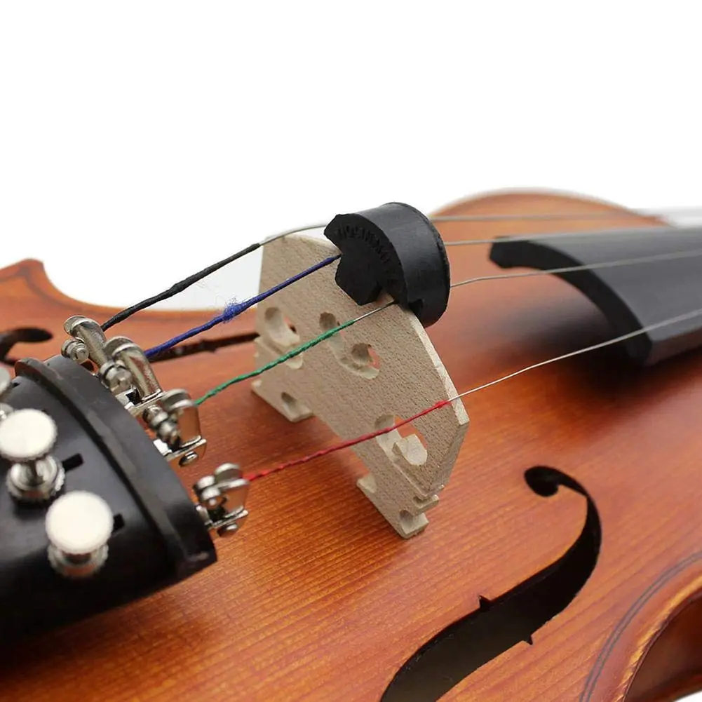 cuerdas de violin tienen bolas y tubo de caucho - De qué está hecha la cuerda