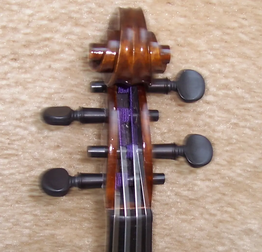angles of the violin pegs - How far should violin pegs protrude