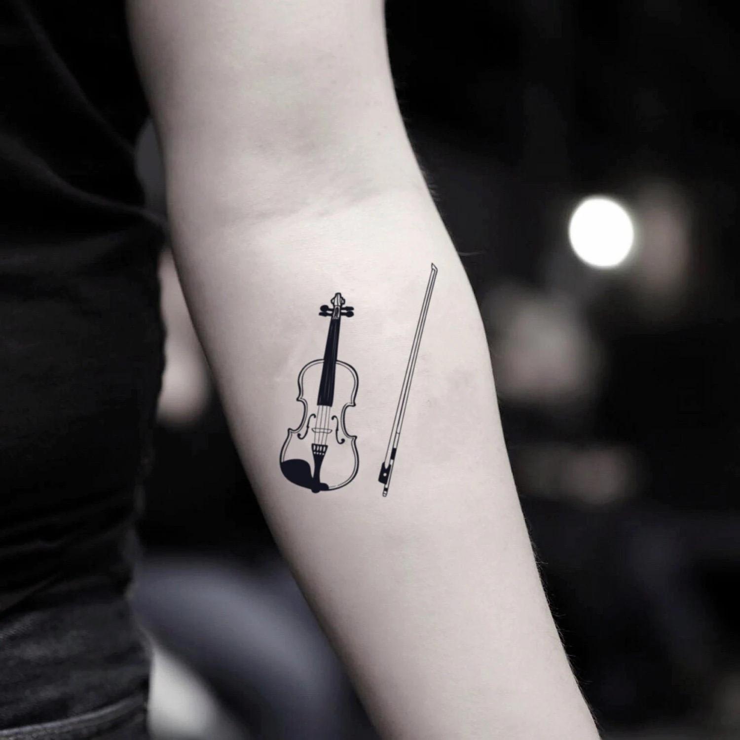 simple violin tattoo - What is the difference between fine line and dot tattoos