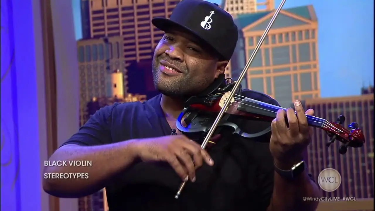 classically trained black violin mega - Who was the violin player on the tape Kev's college professor gave him